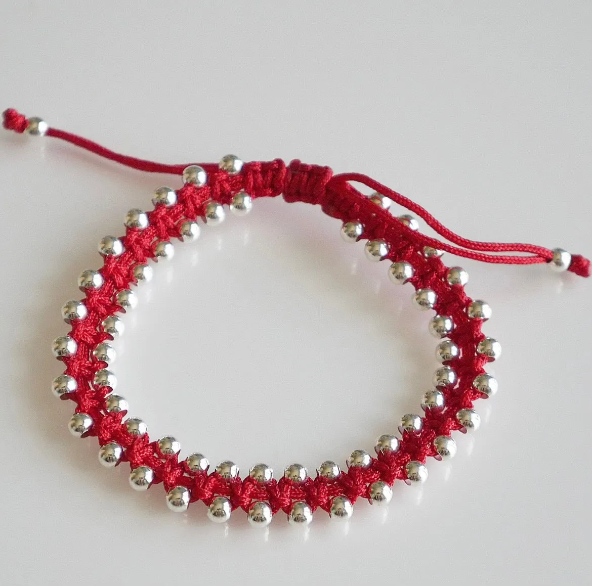 Silver Braided Balls on a  Lucky Red String Adjustable .925 sterling silver Bracelet