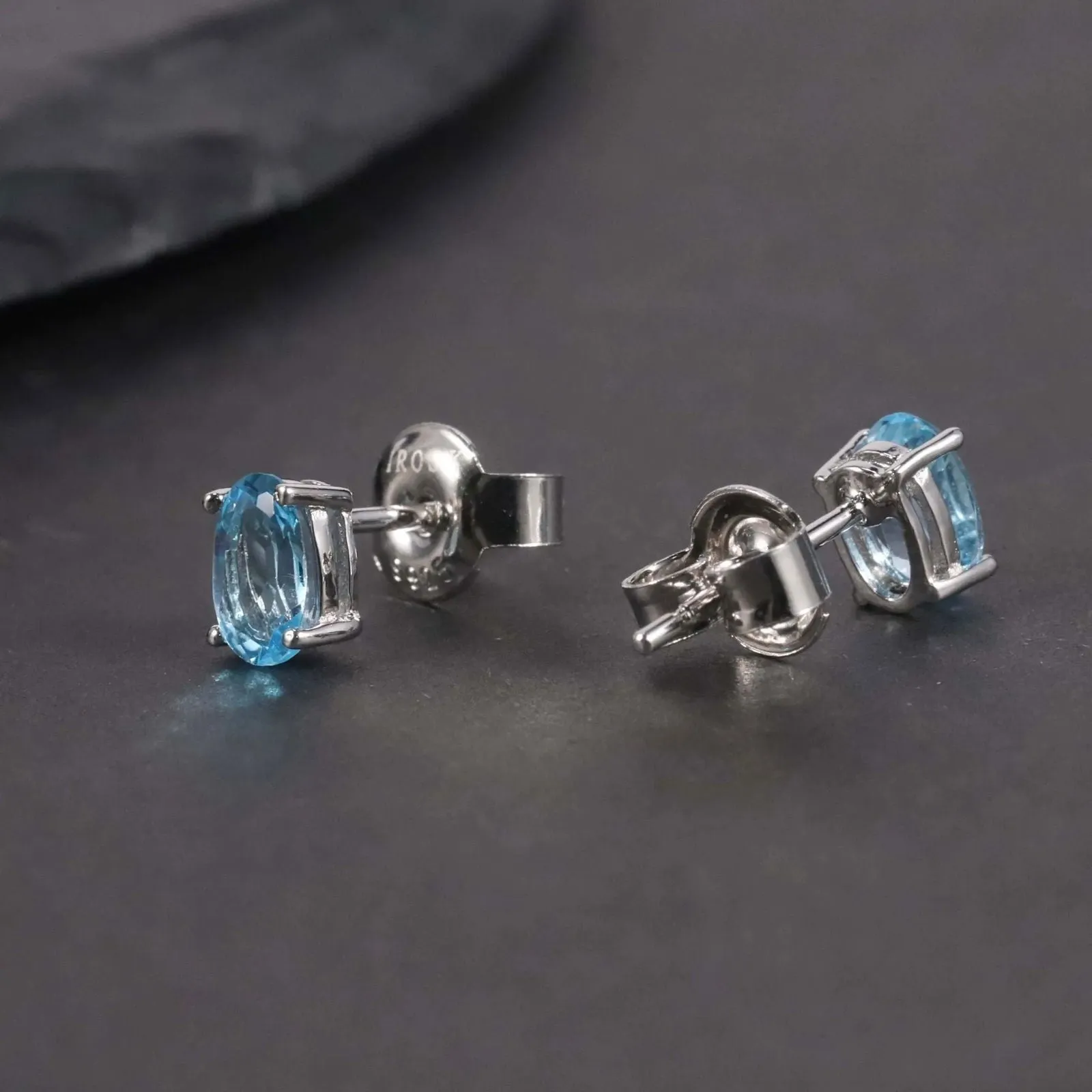 Swiss Blue Topaz Oval Stud Earrings - Sterling Silver